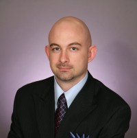 Tim Montoya - Professional headshot