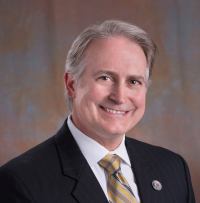 Eric Gardner, CAPT USN(ret) - Professional headshot